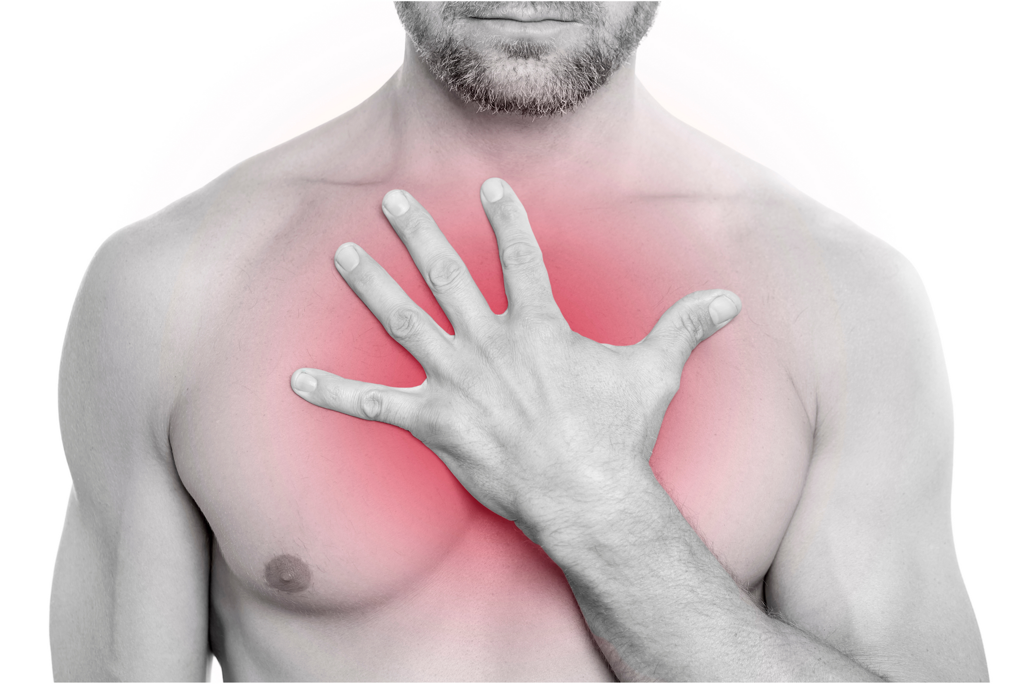 Man grabbing his chest due to chest pain