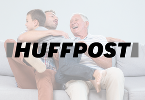 Father, son, and grandfather laugh as they receive a posture corrector